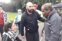 Candide Codjo président de l'ASLAA, devant la vice présidente du comité Régional handisport